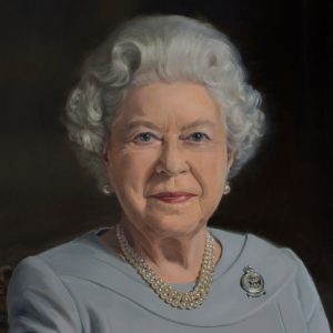 Her Majesty wears a brooch presented to her by the Royal Air Force Regiment, showing the Astral Crown and crossed Lee Enfield rifles.